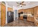 Well-equipped kitchen with stainless steel appliances and custom wood cabinetry at 3333 N 87Th St, Mesa, AZ 85207