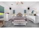 Bright main bedroom boasts carpet, ensuite bath, and stylish decor for ultimate comfort at 3333 N 87Th St, Mesa, AZ 85207