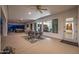 Spacious outdoor patio with seating, dining area, bar and scenic desert mural views for serene entertaining at 3333 N 87Th St, Mesa, AZ 85207