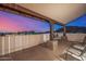 Covered patio overlooking city lights and mountain views at 3333 N 87Th St, Mesa, AZ 85207