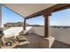 Relaxing rooftop patio with panoramic views and comfortable seating for serene outdoor enjoyment at 3333 N 87Th St, Mesa, AZ 85207