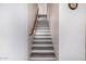 Close-up shot of a modern white stairway with gray stairs at 3333 N 87Th St, Mesa, AZ 85207