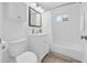 Bright bathroom features a white vanity, shower-tub combo, and a large mirror at 4020 N 34Th St, Phoenix, AZ 85018