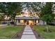 Charming single-story home with mature trees, inviting walkway and desert-friendly landscaping at 4020 N 34Th St, Phoenix, AZ 85018