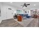 Open-concept living room featuring a modern design, stylish decor, and seamless flow to the dining area at 4020 N 34Th St, Phoenix, AZ 85018