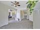 Open-concept living area with easy access to the bathroom and bedrooms at 40845 W Thornberry Ln, Maricopa, AZ 85138