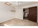 Unfinished basement with open layout and utility connections at 4343 E Union Hills Dr, Phoenix, AZ 85050