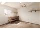 Spacious basement featuring a work bench and shelving at 4343 E Union Hills Dr, Phoenix, AZ 85050