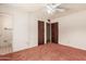 The bedroom boasts a fan, closet, and adjacent bathroom, providing comfort and convenience at 4343 E Union Hills Dr, Phoenix, AZ 85050