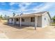 The back of the house features a concrete parking area and a covered patio at 4343 E Union Hills Dr, Phoenix, AZ 85050