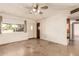 Inviting living room with access to outdoor views and a neutral color scheme at 4343 E Union Hills Dr, Phoenix, AZ 85050