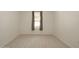 Bright bedroom with tile floors and window at 4349 E Windsor Ct, Gilbert, AZ 85296