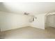 Bright living room with staircase and tile floors at 4349 E Windsor Ct, Gilbert, AZ 85296