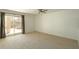 Bright living room with tile floors and access to back yard at 4349 E Windsor Ct, Gilbert, AZ 85296
