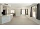 Bright living room with open kitchen and tile floors at 4349 E Windsor Ct, Gilbert, AZ 85296
