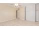 Bedroom featuring a closet, light walls, and wood-look floors at 4826 S 26Th Ln, Phoenix, AZ 85041