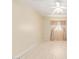 Bright bedroom features light walls and floors, and large window with decorative curtains at 4826 S 26Th Ln, Phoenix, AZ 85041