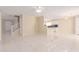 View of the spacious living room with tile flooring and open layout at 4826 S 26Th Ln, Phoenix, AZ 85041