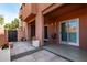 Relaxing patio with tiled flooring and stucco accents offering a cozy outdoor space at 540 N May -- # 1075, Mesa, AZ 85201
