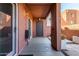 Cozy patio area with textured stucco and convenient access doors at 540 N May -- # 1075, Mesa, AZ 85201