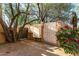 Private gated yard with desert landscaping, trees, and shrubbery at 5616 E Desert Vista Trl, Cave Creek, AZ 85331