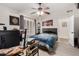 A bedroom with a ceiling fan, carpet floors, and ample natural light at 5616 E Desert Vista Trl, Cave Creek, AZ 85331
