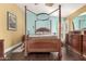 A primary bedroom with a ceiling fan, hardwood floors, and ample natural light at 5616 E Desert Vista Trl, Cave Creek, AZ 85331
