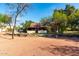 The exterior of this house features desert landscaping, and a covered porch at 5616 E Desert Vista Trl, Cave Creek, AZ 85331