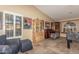 Inviting living room featuring travertine flooring, bright light, and lots of decor at 5616 E Desert Vista Trl, Cave Creek, AZ 85331