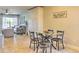 Stylish dining room with modern table and chairs, open to the living area, and featuring sleek tile flooring at 5950 N 78Th St # 102, Scottsdale, AZ 85250