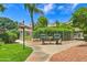 Community grill area with barbecue pits, seating, landscaping, and walking path at 5950 N 78Th St # 102, Scottsdale, AZ 85250