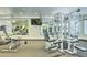 Community gym featuring modern exercise equipment, rubber flooring, and mirrored walls at 5950 N 78Th St # 102, Scottsdale, AZ 85250