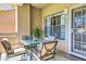 Cozy outdoor patio with cushioned seating and a table, perfect for relaxing or entertaining at 5950 N 78Th St # 102, Scottsdale, AZ 85250