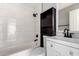 Bathroom features a white vanity and modern tile and fixtures at 6033 S 19Th Pl, Phoenix, AZ 85042