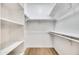 Walk-in closet with shelving and ample storage space, providing organization and convenience at 668 S Catalina St, Gilbert, AZ 85233
