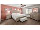 Serene bedroom featuring neutral tones, plush bedding, and ample natural light at 6746 W Wethersfield Rd, Peoria, AZ 85381