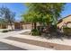 Beautiful two-story home showcasing desert landscaping and a two-car garage at 6746 W Wethersfield Rd, Peoria, AZ 85381