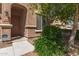 Inviting front door of a well-maintained home, showing desert landscaping at 6746 W Wethersfield Rd, Peoria, AZ 85381