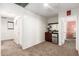 Hallway area with a built-in cabinet and mini-fridge at 6746 W Wethersfield Rd, Peoria, AZ 85381