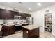 Functional kitchen with stainless steel appliances, an island, and abundant cabinet space at 6746 W Wethersfield Rd, Peoria, AZ 85381