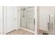 White framed shower stall with glass doors at 6746 W Wethersfield Rd, Peoria, AZ 85381