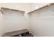 Walk-in closet with bench at 6746 W Wethersfield Rd, Peoria, AZ 85381