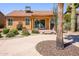Inviting backyard with desert landscaping, mature plants and covered patio at 6831 S Coral Gable Dr, Chandler, AZ 85249