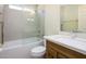 Bright and stylish bathroom with a glass-enclosed shower, elegant vanity, and modern fixtures at 6831 S Coral Gable Dr, Chandler, AZ 85249