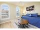 Cozy bedroom featuring a comfortable daybed, stylish round table, and inviting decor at 6831 S Coral Gable Dr, Chandler, AZ 85249