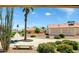 Charming community featuring well-maintained landscaping, palm trees, and inviting walkways at 6831 S Coral Gable Dr, Chandler, AZ 85249