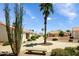 Charming community featuring well-maintained landscaping, palm trees, and inviting walkways at 6831 S Coral Gable Dr, Chandler, AZ 85249