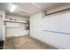 Spacious garage featuring built-in white cabinets for ample storage space and organization at 6831 S Coral Gable Dr, Chandler, AZ 85249