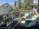 Charming outdoor balcony featuring stylish furniture and lush greenery, perfect for relaxing and enjoying the fresh air at 7272 E Gainey Ranch Rd # 121, Scottsdale, AZ 85258