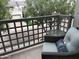 A cozy balcony with views of the neighborhood, featuring comfortable seating and a charming ambiance at 7272 E Gainey Ranch Rd # 121, Scottsdale, AZ 85258